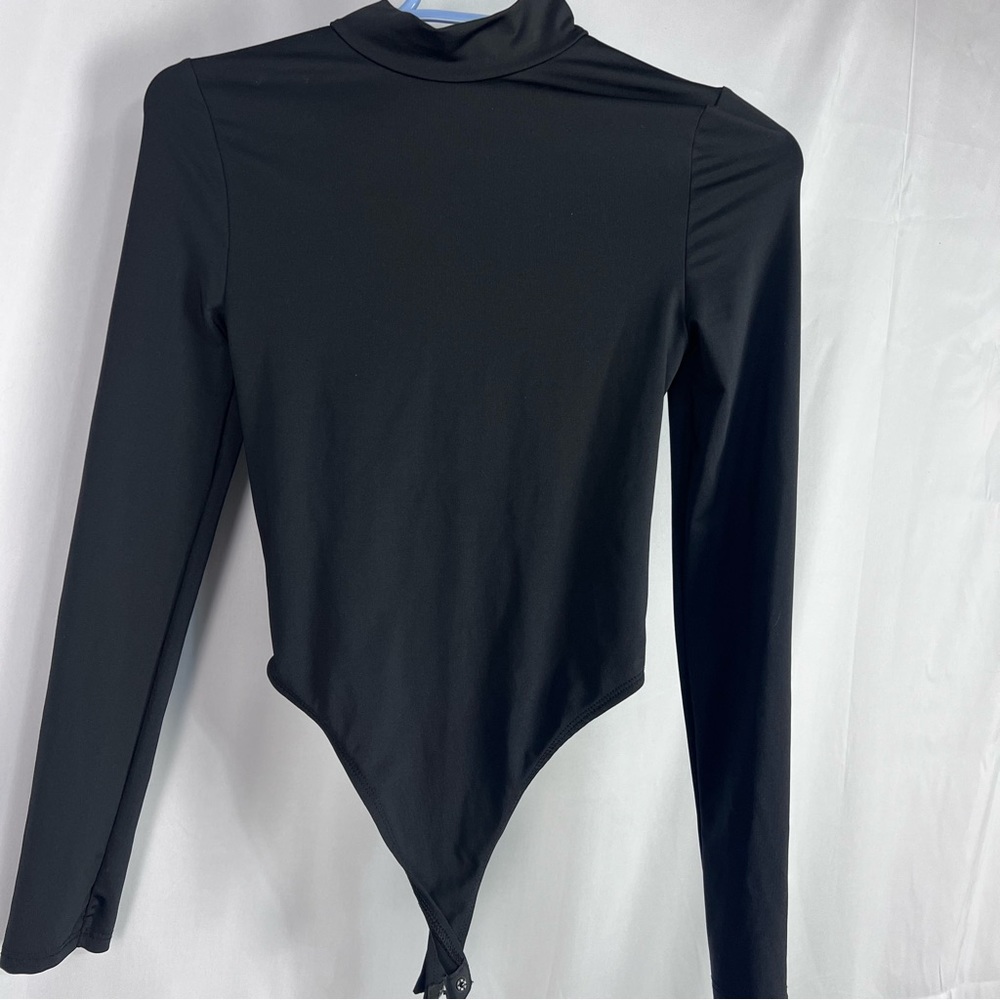 Topshop Black long sleeve Bodysuit. Size 4.